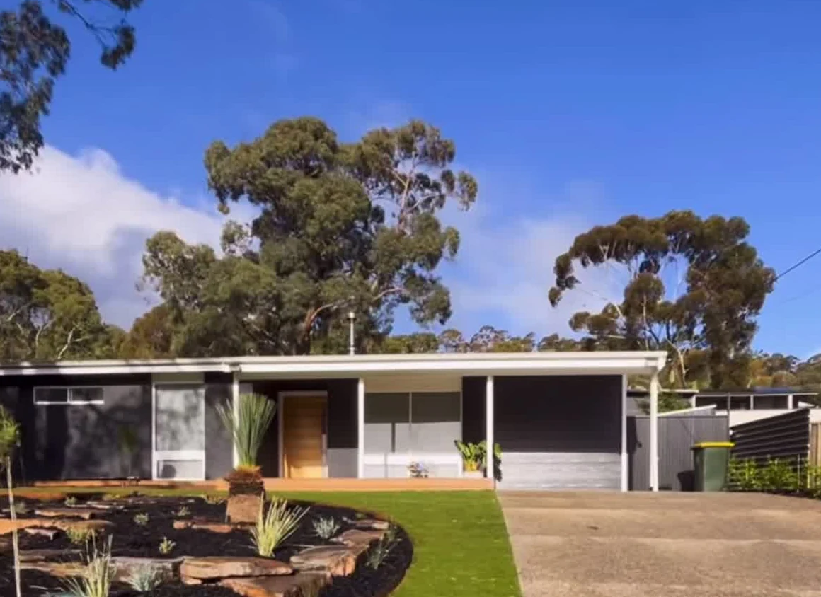 Completed Valley landscaping with rock terraces, lawn, trees and planting