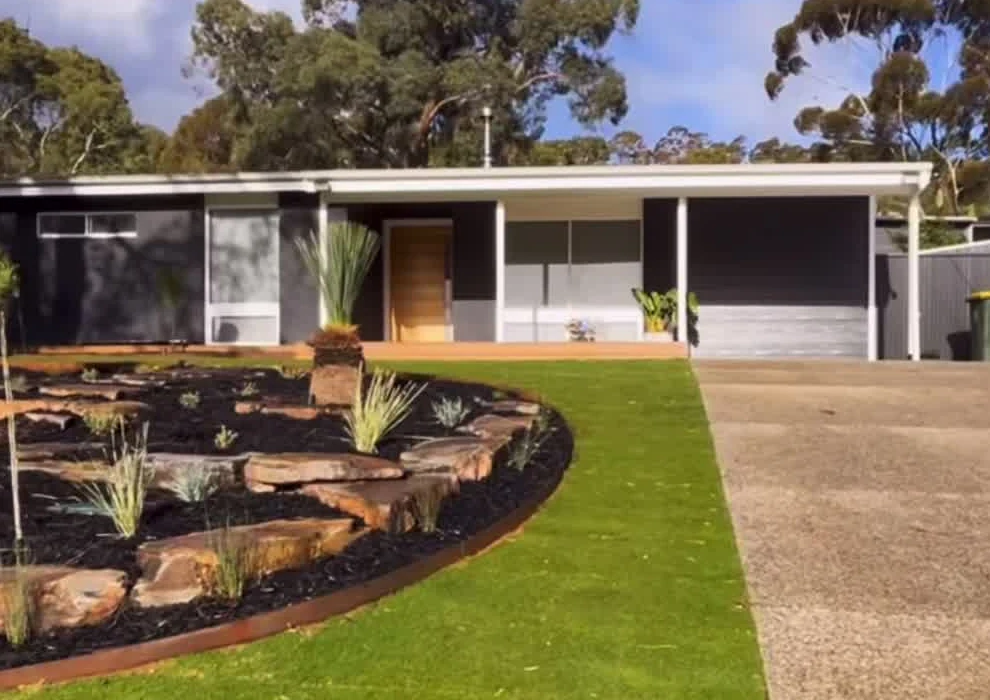 Valley’s completed landscape, with natural rock terraces, lawn, trees and planting