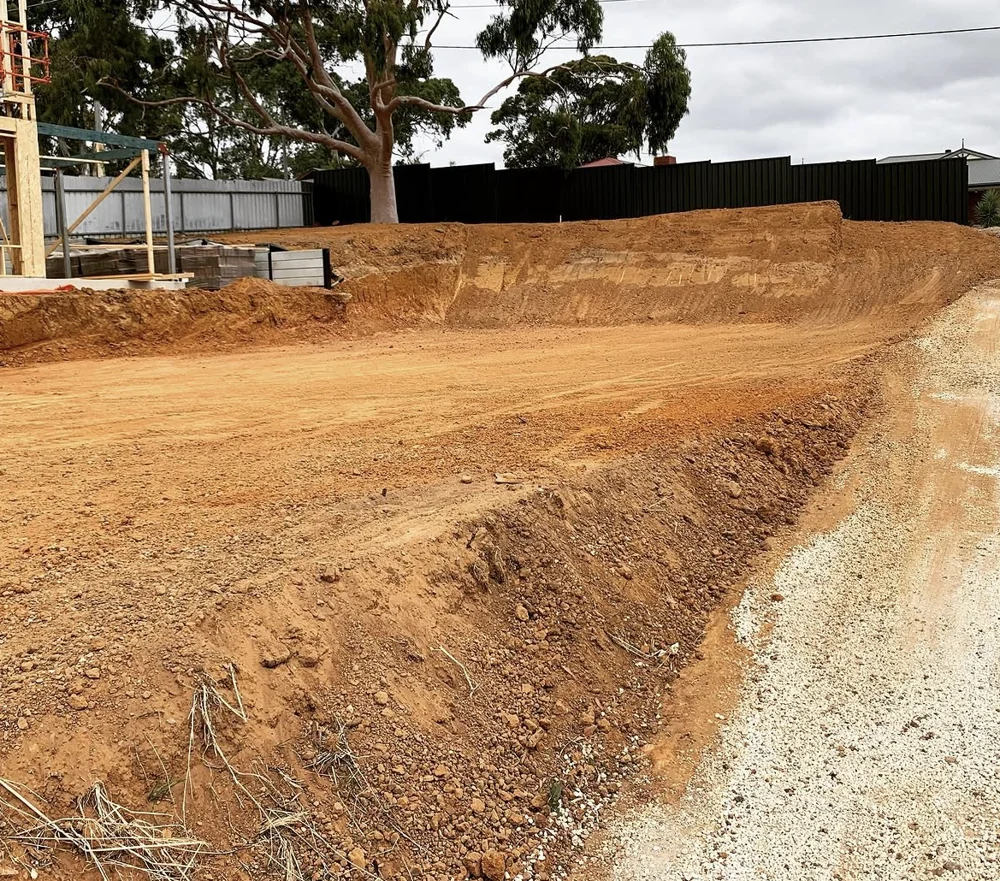 Excavated residential site with exposed earth