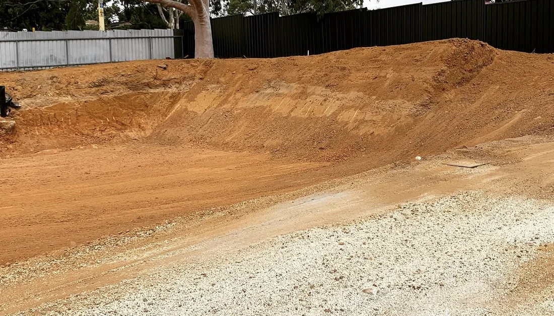 Excavated and levelled residential site with exposed earth